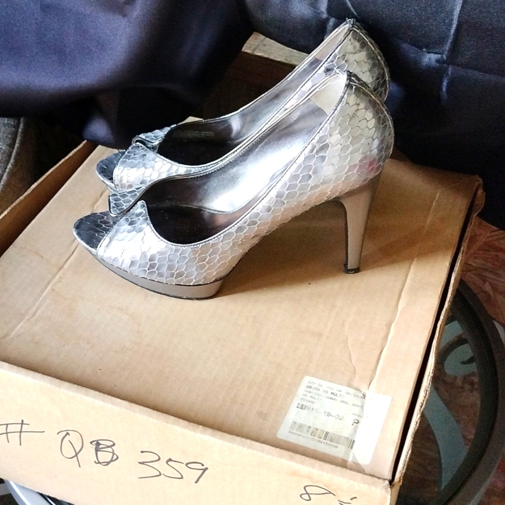 Snake print pumps